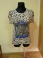 Blusa larga con estampado de leopardo